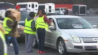 New Birth Church hosts Thanksgiving turkey giveaway as need surges