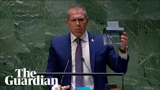 UN votes to back Palestinian membership, prompting Israeli envoy to shred charter