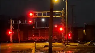 CN 2276 leads mixed freight at Oak St 2-13-22