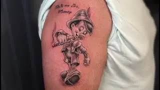 Pinokio tattoo as a memorial design for young boy