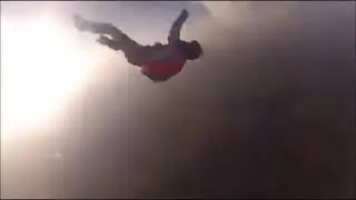 DAMN: Skydiver Gets knocked Out...Friend Saves Him in Mid-Air!