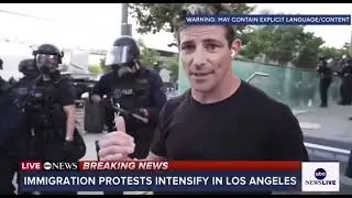 ABC News reporter Matt Gutman stays calm as an LAPD officer shoves him and yells in his face.