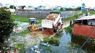 Awesome BUlldozer and Trucks Start to Pushing  Rock in raining season to remove dirty water and garb