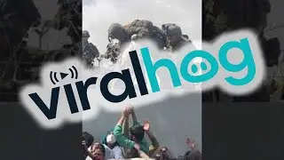 Afghan Infant Passed to Soldiers at Airport || ViralHog