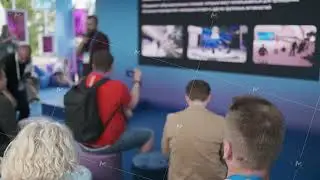 Interactive presentation at a technology event with audience capturing moments