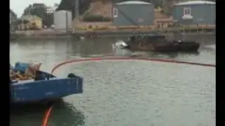 Oil containment boom deployment