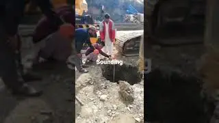 checking sounding of pile at bridge./pile sounding