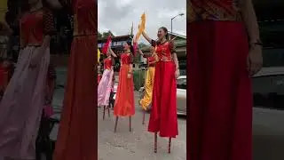 Girls walking on stilt