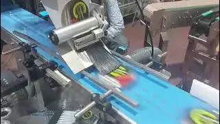 Top lid labeling machine by TADBIK