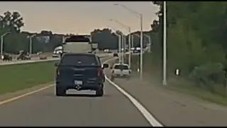 Car passes on the merge lane.