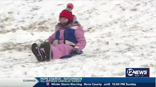 Families enjoy winter weather together in College Hill, Wichita