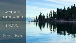 1 hour on a mirror-like Lake Tahoe reflecting trees and mountains above and below, 4k video