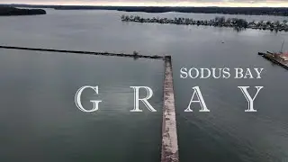 Sodus Bay New York beautiful aerials filmed of a gray day in Winter on Lake Ontario