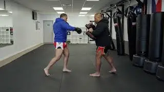 Master Muay Thai Pad Holding Techniques for Round Kicks and Punches