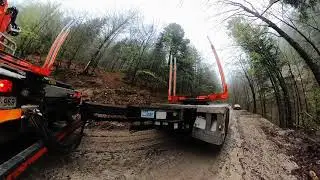 Mercedes Arocs 3351 6x6 timber truck in forest road