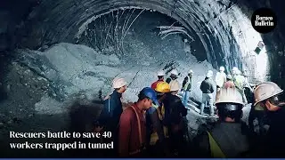 Rescuers battle to save 40 workers trapped in tunnel