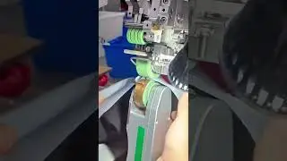 sealing seams on waterproof fabric using a heat bonding machine to ensure outdoor gear is durable