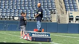 Julius Mina performs the National Anthem for the Seattle Seahawks Training Camp Mock Game