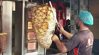 Arabic shawarma chicken cutting skills.