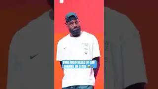 LeBron was unfazed by a fan running on stage 😅