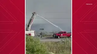 10 acre grass fire burning near San Luis Pass bridge in Galveston