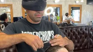 Barber gives a kid full haircut with blond gold on for $25