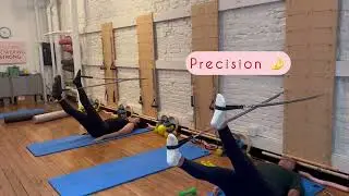 Bodytonic Pilates Seattle - Springboard Feet in Straps