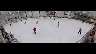 Caden Fine #12 dark jersey goal at NCDC camp