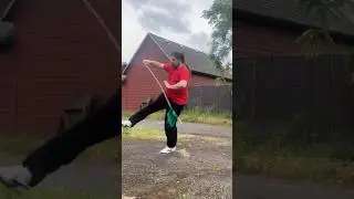 Martial arts weapons expert practicing a dangerous chain whip.