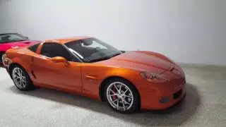 Chevy corvette  2009 Z06 atomic orange metallic  6500 miles
