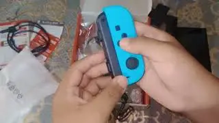 Abriendo el regalo que me tragieron para m&iacute; era Nintendo switch 