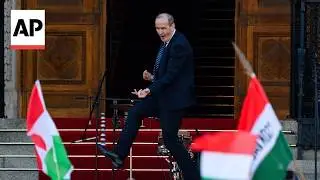 Hungary's next health minister dances outside parliament at Magyar's inauguration