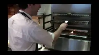 Ben Tish of The Opera Tavern cooks the Iberico Pork Burger