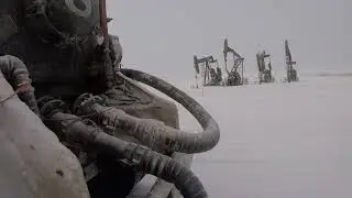 Bakken Oilfield Work/strapping tank