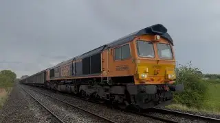 Diesel locomotive Uk 4 different trains 66782 170114 66310 66707 passing the crossing great tones