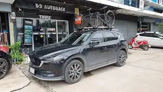 Mazda CX5 แร็คจักรยานบนหลังคา Thule ThruRide 565 + แร็คหลังคา thule ตรงรุ่น