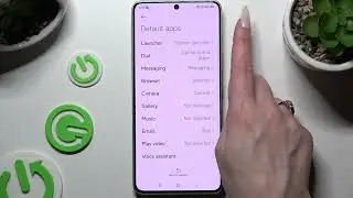 How do I change the default apps on the REDMI Note 13R?