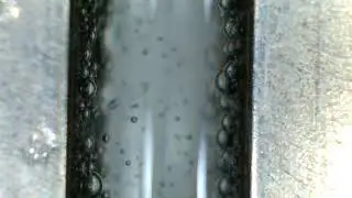 High Voltage Electrolysis of water-under a microscope-Tap and Distilled comparison