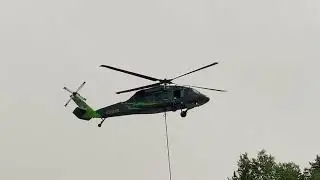 Blackhawk helicopter 🚁 landing at the airport after doing an airdrop on the forest fire