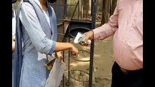 শারীরিক তাপমাত্রা মাপার পরেই প্রবেশ পরীক্ষার্থীদের/ Entrance test after measuring body temperature