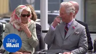 Charles and Camilla break into laughter while watching throat singers - Daily Mail