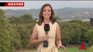 7NEWS presenters Mike Smithson and Gertie Spurling laugh at a technical malfunction.