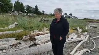 Orca Network Volunteer Jan Bell talks about her cedar/flower offering for the Penn Cove ceremony