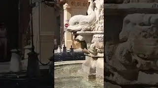 Spitting fish tower statue water fountain at Aix-En-Provence | southern france in Europe (7/25/2025)