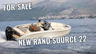 RAND SOURCE 22: Minimalistic grey modern boat for sale, outboard powered, luxury seating.