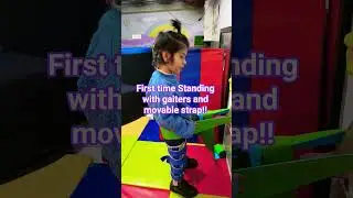 Standing independently with gaiters by involving in self engaging activity #baby