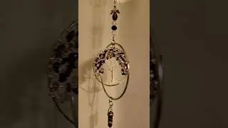 4 inch amethyst suncatcher.