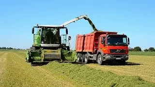 Two trucks cutting grass side by side 🚛🌿