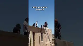 Native men working on the roof