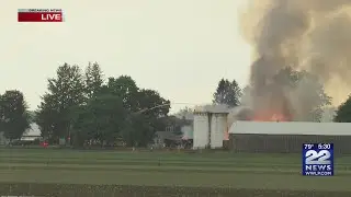 Firefighters work to put out large barn fire on Meadow Street in Amherst